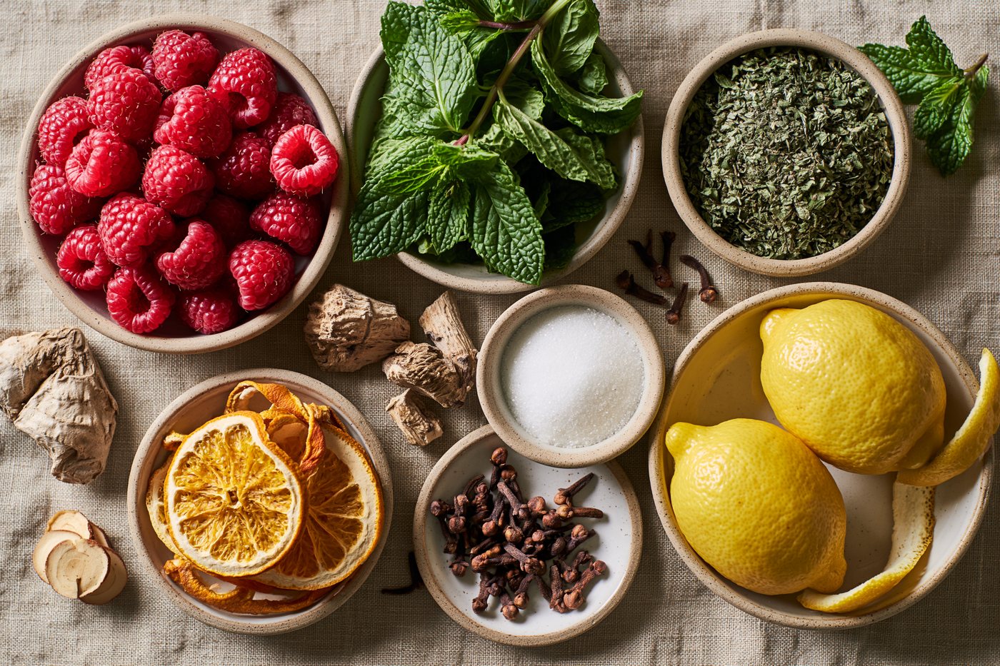 The dried botanicals laid out in small dishes