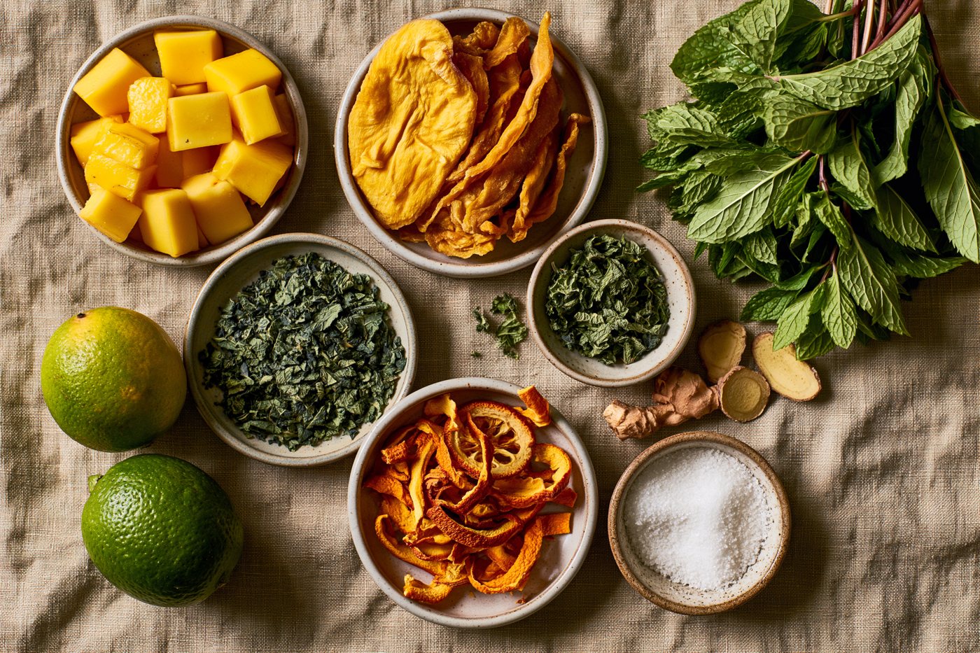 The dried botanicals laid out in small dishes