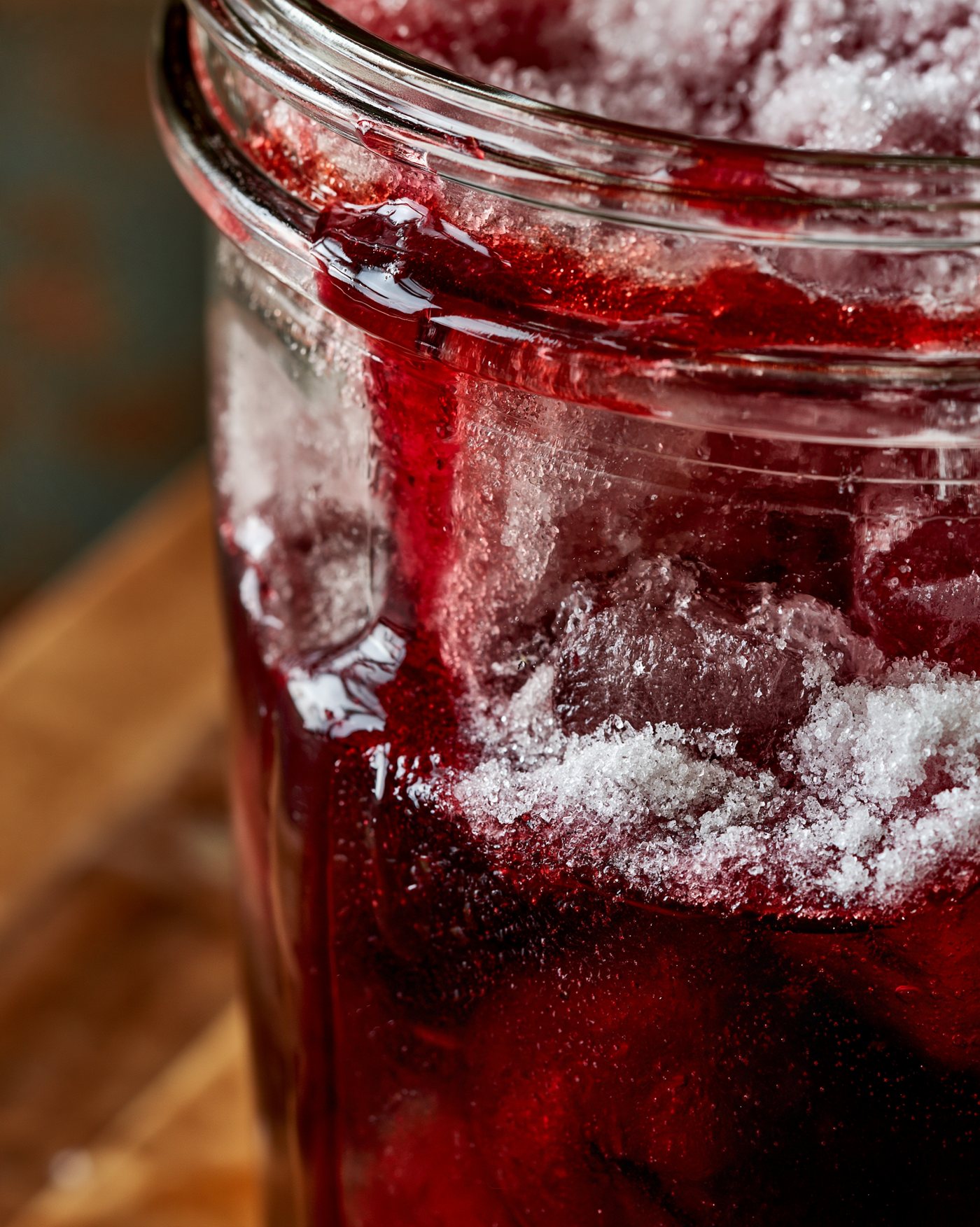 Pour off, then sugar the cherries